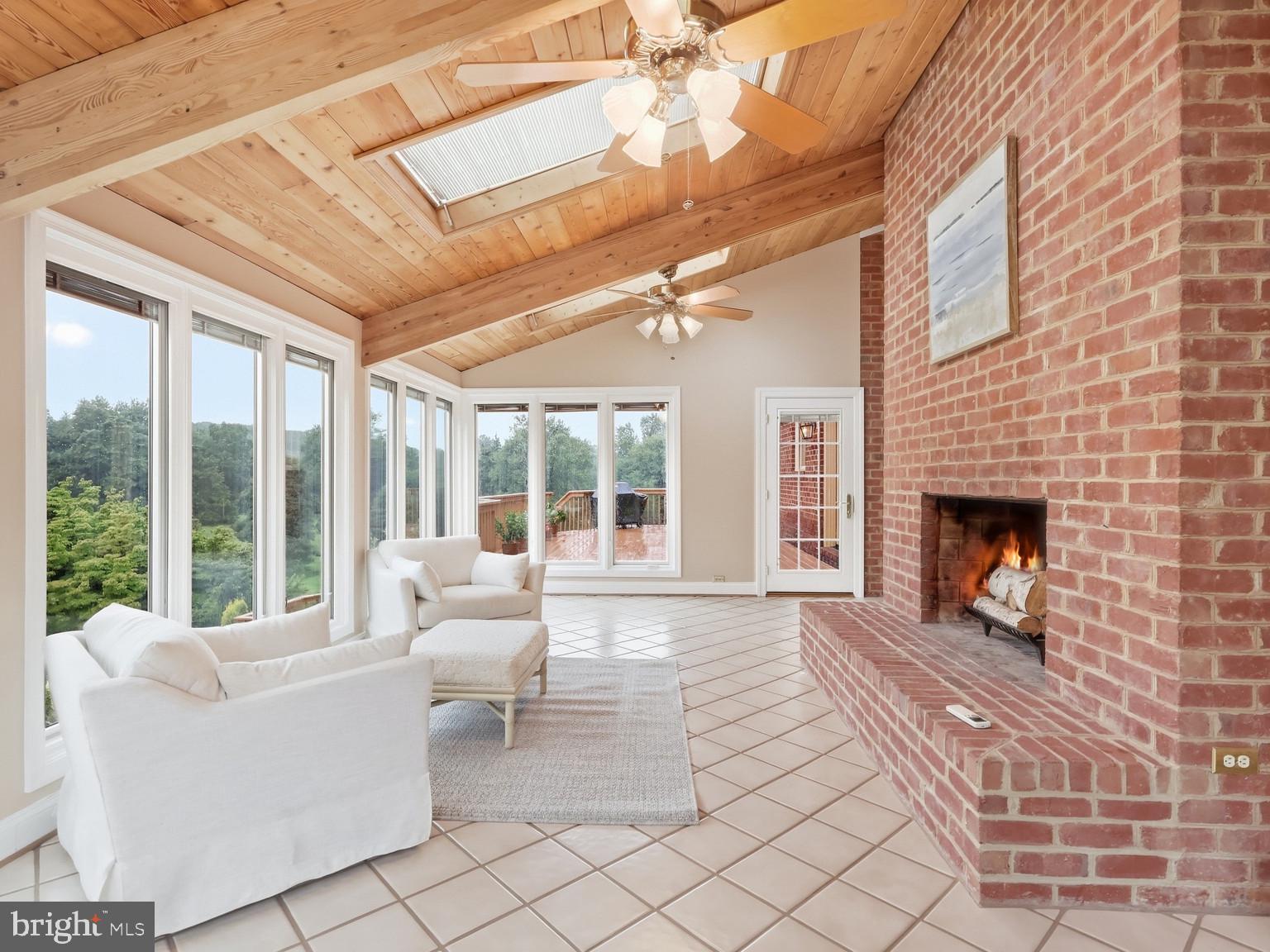 6700 Clifton Road Clifton, VA 20124 - Photo 23 of 125 Sunroom w/Skylights and Wood burning fireplace