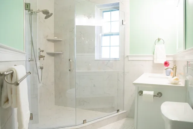 a view of multiple houses and a yard