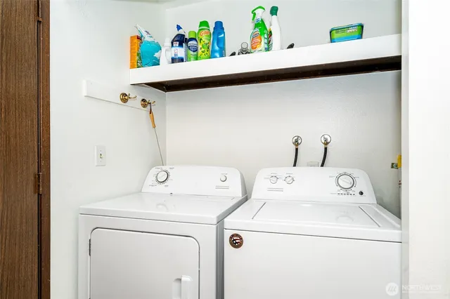 a utility room with dryer and washer