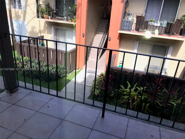 a bathroom with a shower and closet