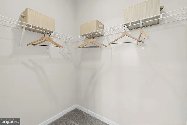 a view of a room with racks on the wall