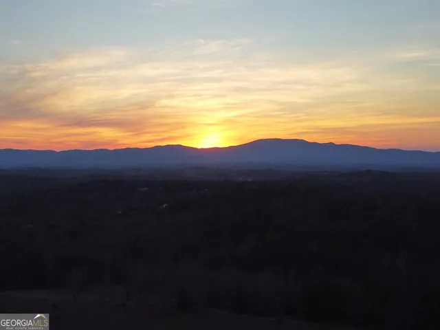 a view of ocean and mountain