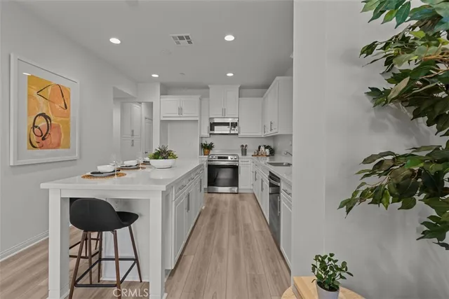 a close view of dining table with cabinets