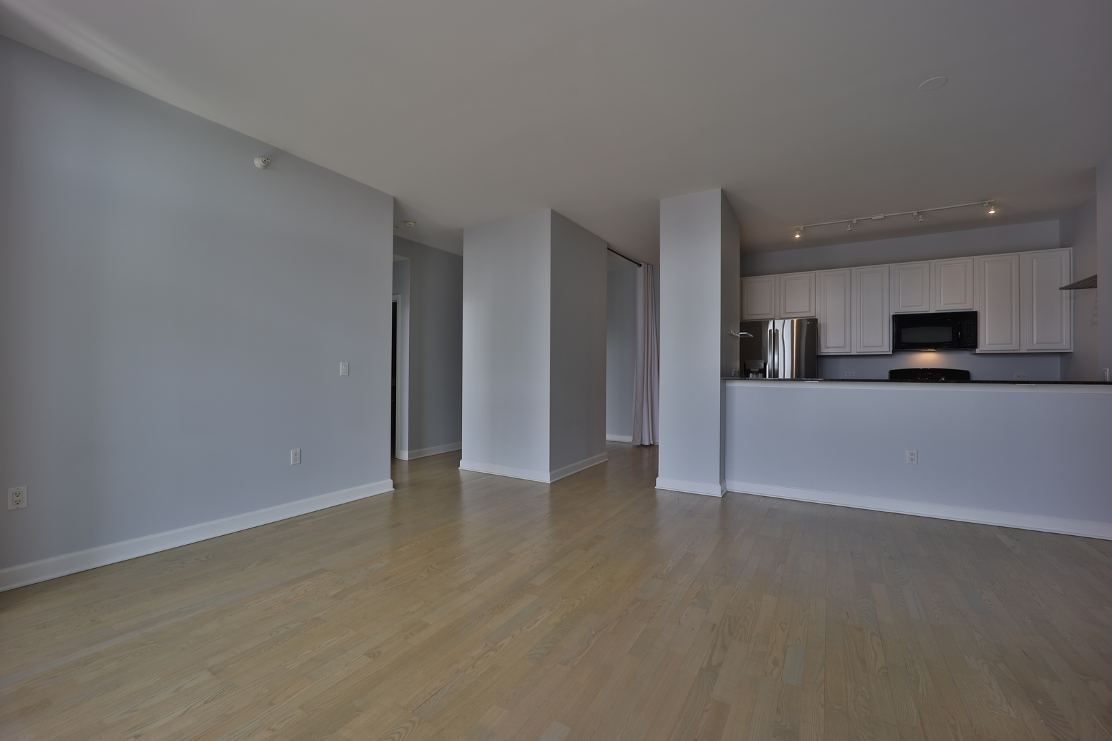 233 East 13th Street, Unit 1708 Chicago, IL 60605 - Photo 5 of 15 a view of a kitchen with a sink