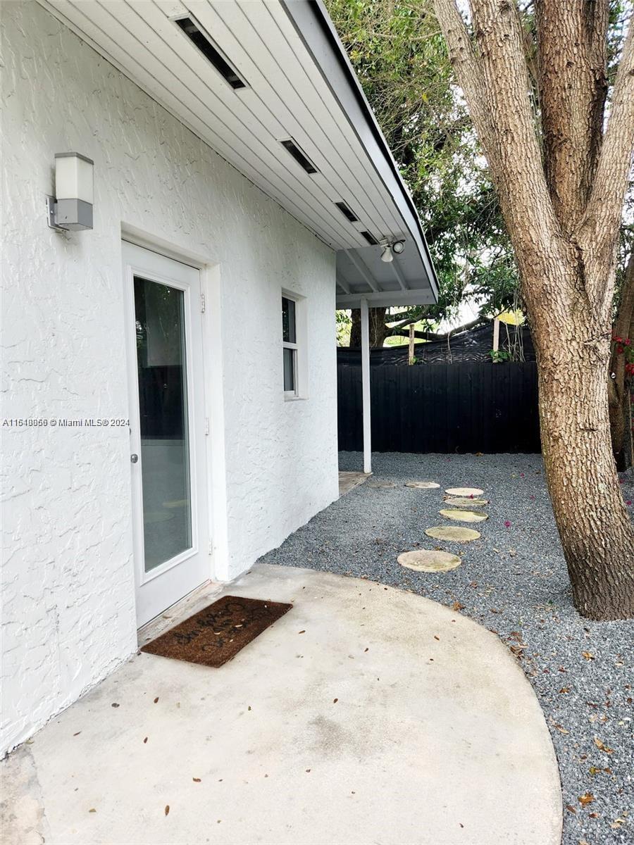 261 Northwest 50th Street, Unit R Miami, FL 33127 - Photo 2 of 10 a view of outdoor space and yard