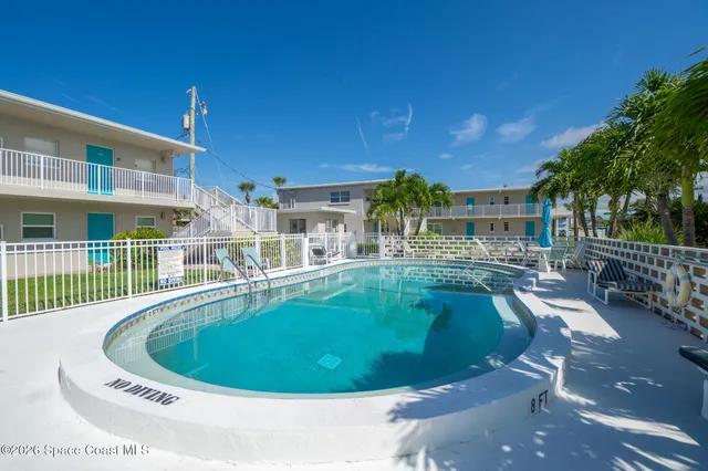 a view of outdoor space swimming pool and patio