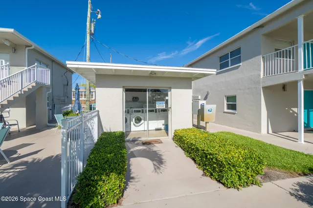 a front view of a house with a porch