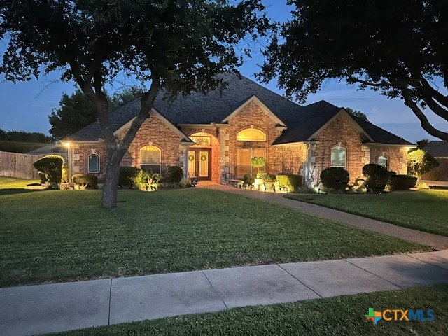 210 Ranchgate Trail McGregor, TX 76657 - Photo 1 of 33 Twilight view of Ranchgate Trail