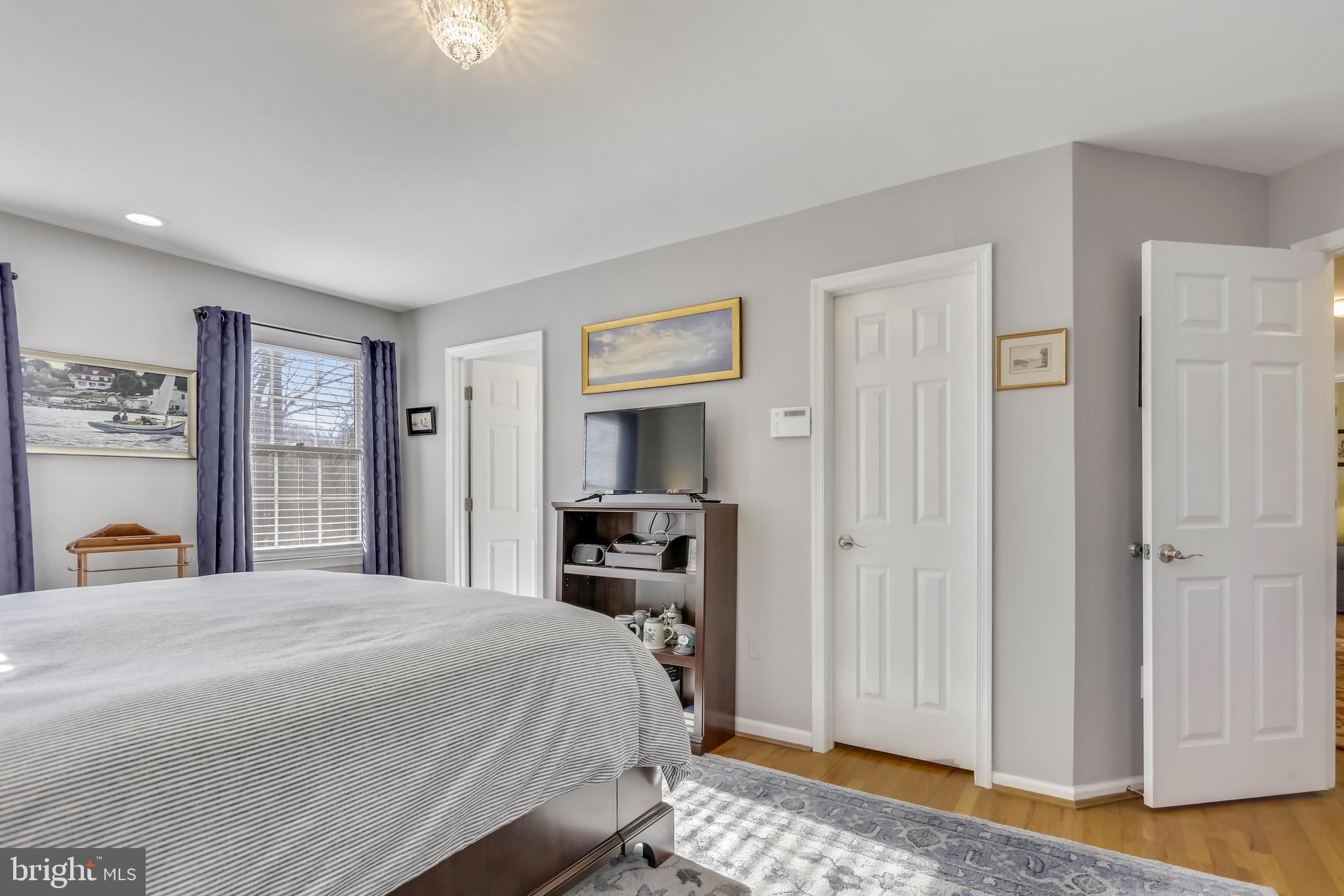 10783 Kinloch Road Silver Spring, MD 20903 - Photo 21 of 43 a bedroom with a bed and a television