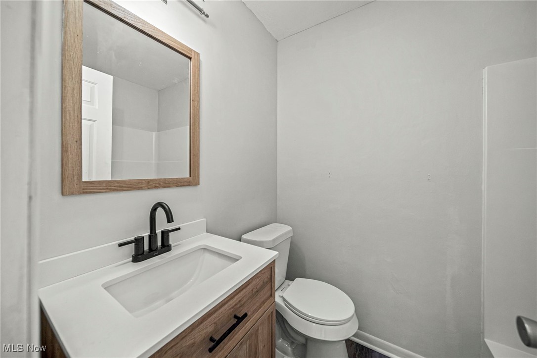 91 Paradise Road Painesville, OH 44077 - Photo 30 of 39 Bathroom with vanity and toilet