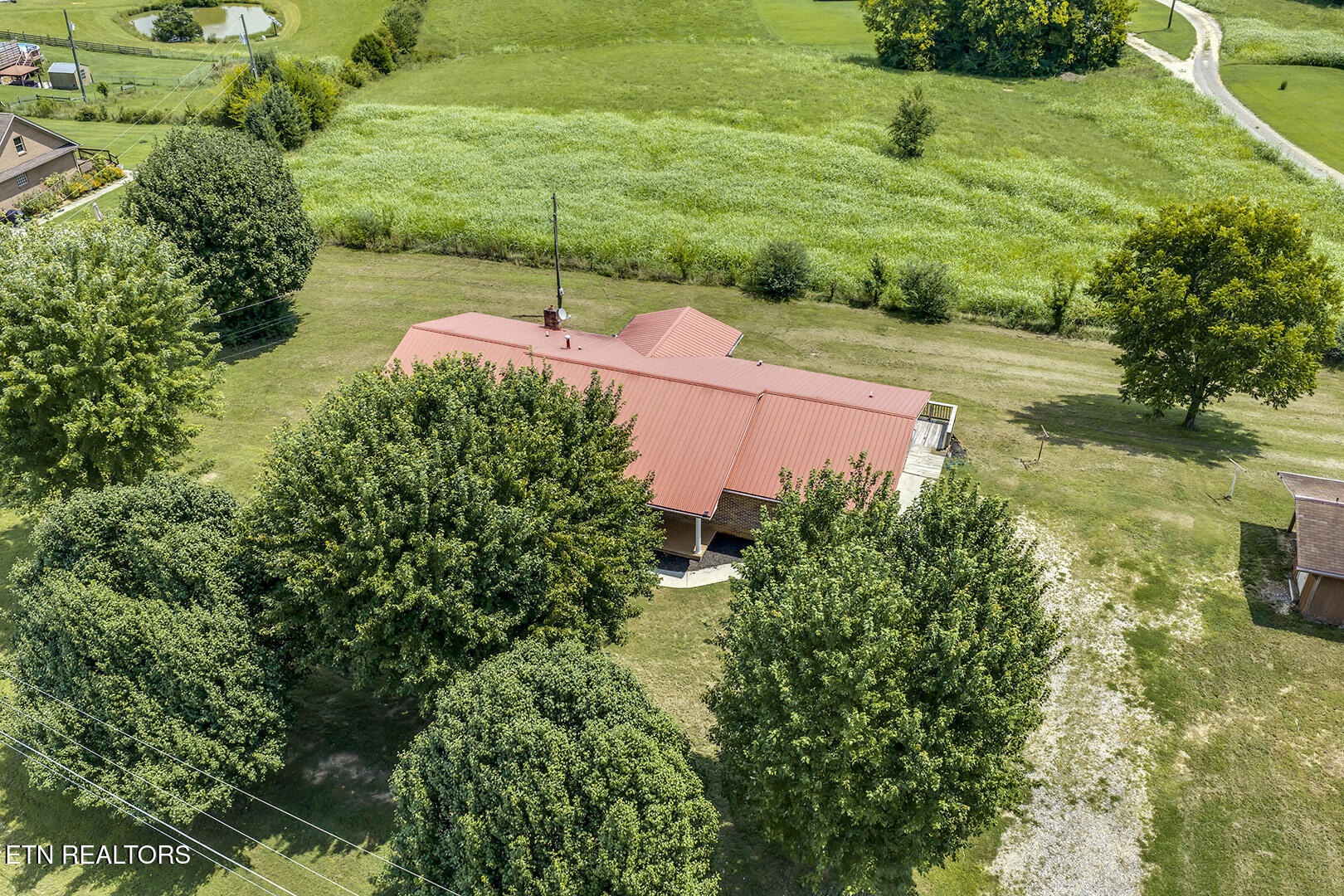 8055 Steekee Creek Road Loudon, TN 37774 - Photo 4 of 60 04_SteekeeCreekRoad_8055_FrontRightEleva