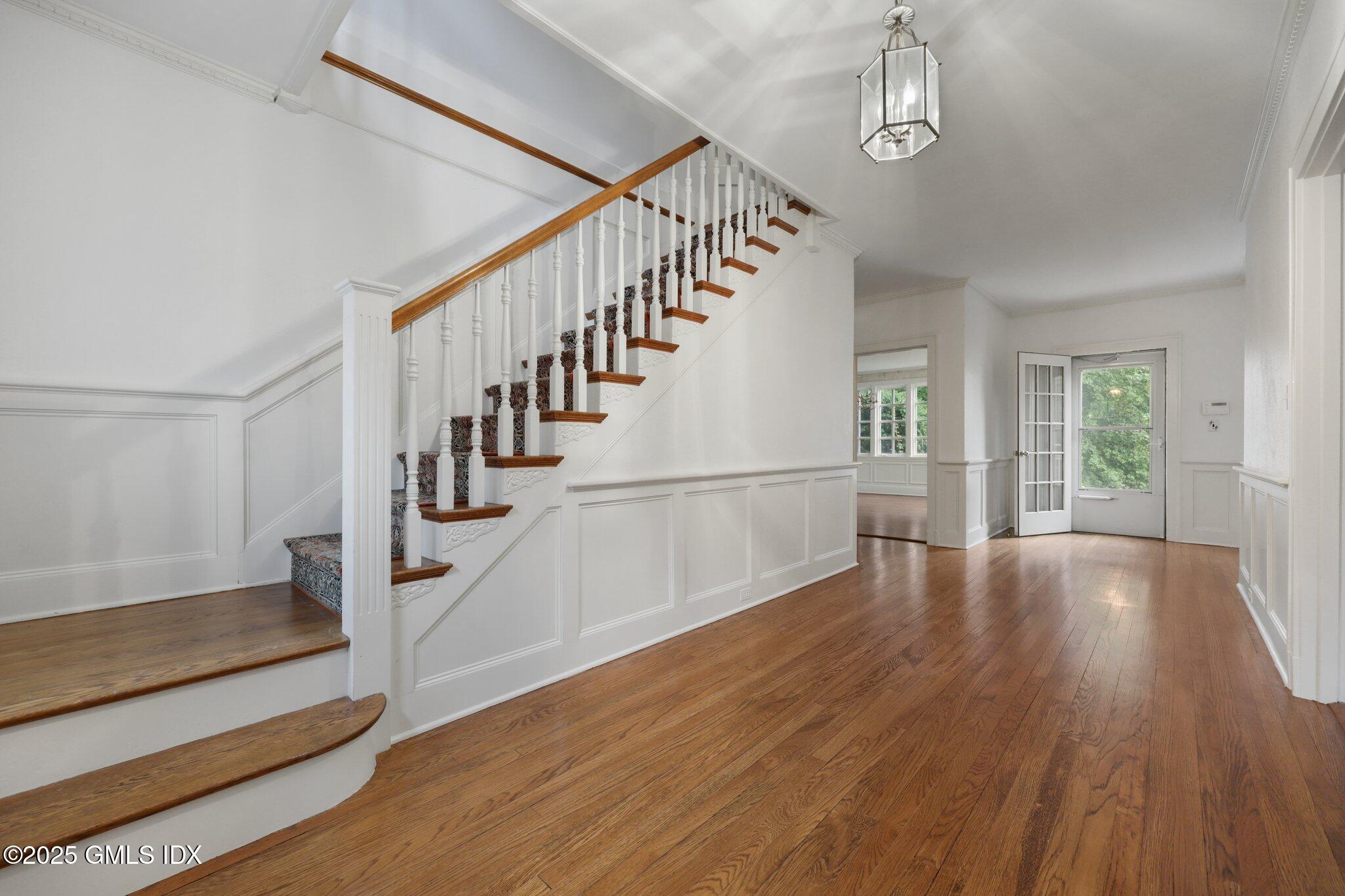 11 Stanwich Road Greenwich, CT 06830 - Photo 13 of 25 a view of entryway and hall with wooden floor