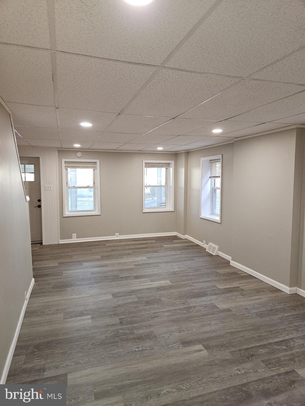 4216 Post Road Trainer, PA 19061 - Photo 10 of 27 a view of empty room with window and wooden floor