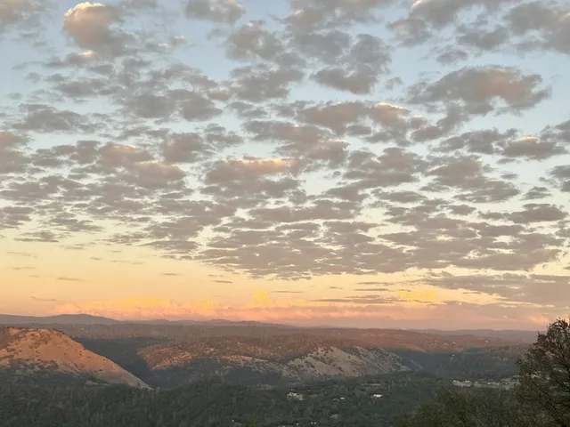 a outdoor space with patio furniture and shower