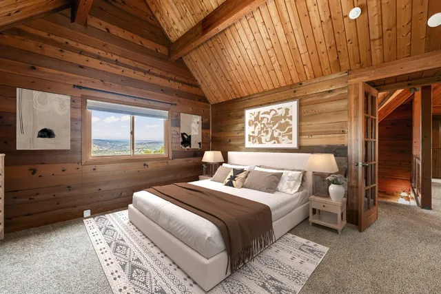 a view of a balcony with furniture