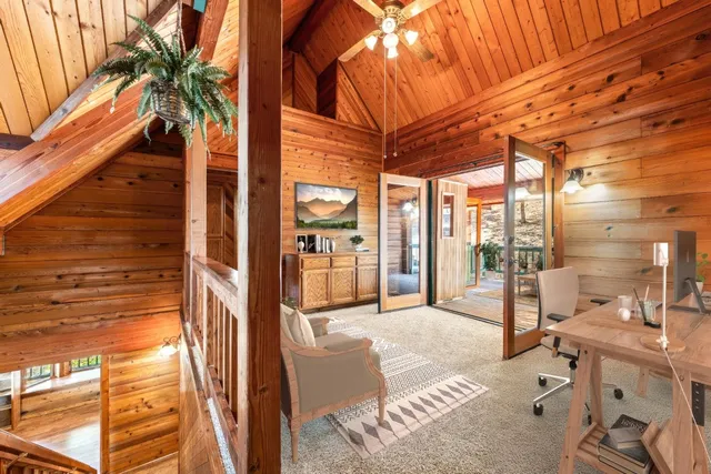 a bathroom with a sink mirror vanity and toilet