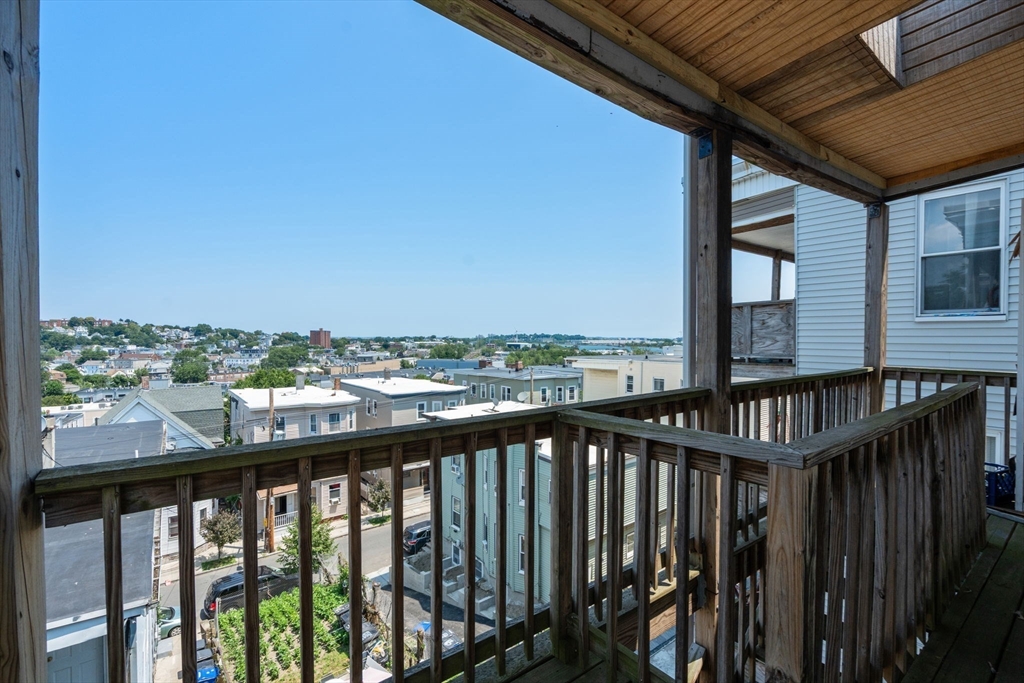 86 Grove Street Chelsea, MA 02150 - Photo 9 of 10 a view of city from a balcony