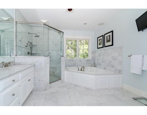 1 Dean Road Wellesley, MA 02481 - Photo 12 of 17 a bathroom with a tub sink double vanity granite and a bathtub