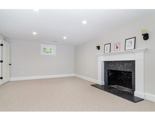 1 Dean Road Wellesley, MA 02481 - Photo 15 of 17 a living room with furniture and a fireplace