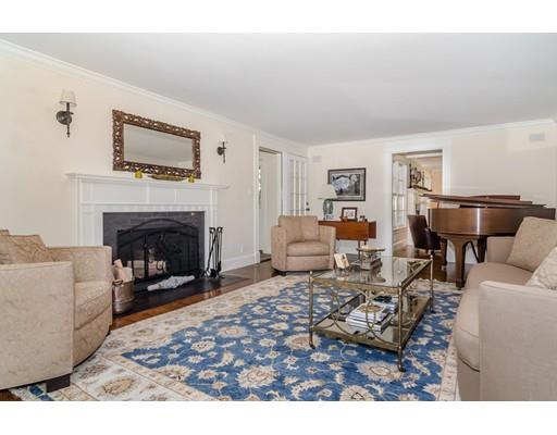 1 Dean Road Wellesley, MA 02481 - Photo 7 of 17 a living room with furniture and a fireplace