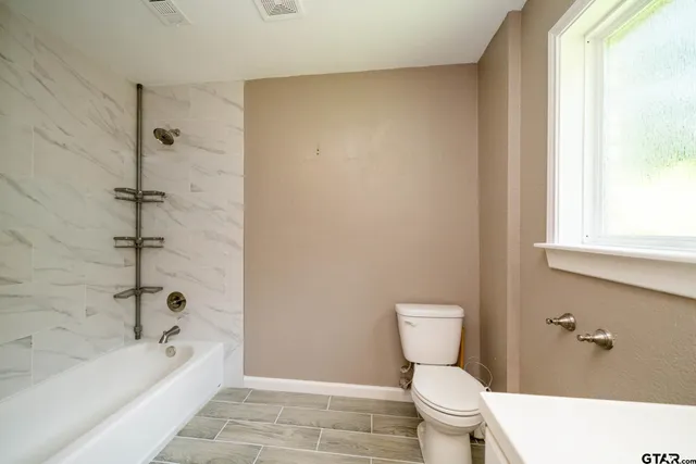 a bathroom with a bathtub
