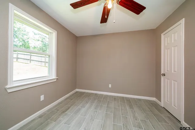 an empty room with window