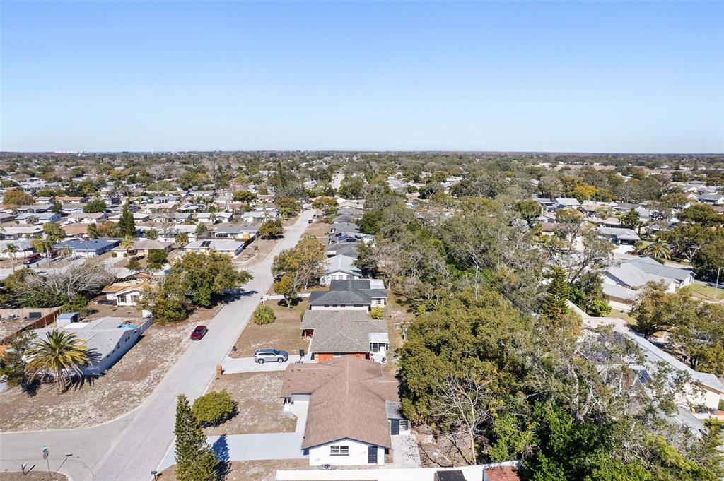 10536 Laburnum Drive Port Richey, FL 34668 - Photo 28 of 33 an aerial view of residential house and parking space