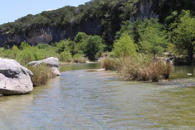 a view of a lake with a mountain