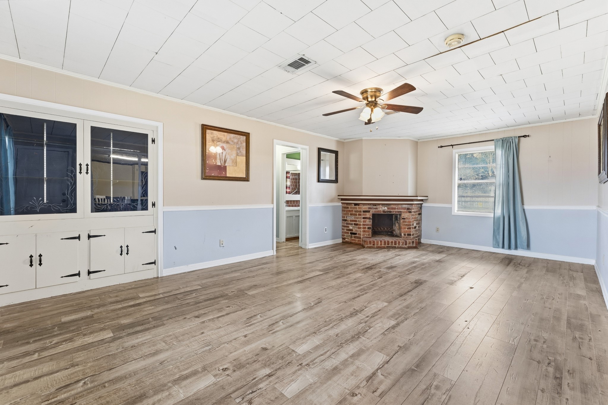 704 Cook Road Winnie, TX 77665 - Photo 7 of 18 Large living Room with wood burning fireplace