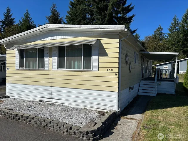 a front view of a house with balcony