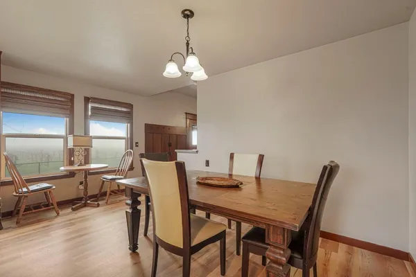 a view of a dining room with furniture