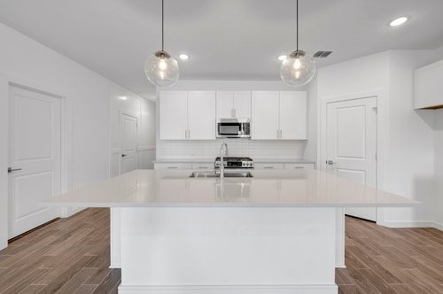 7914 Jasper Mdws Way Angleton, TX 77515 - Photo 7 of 33 Island kitchen