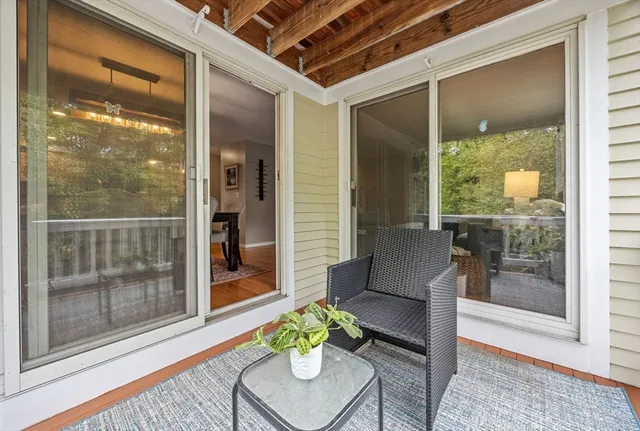 a room with furniture and a potted plant