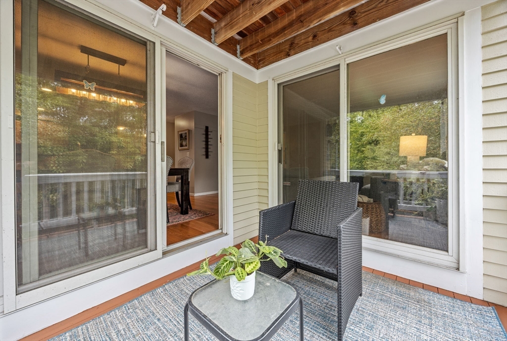 120 Abington Road, Unit 120 Danvers, MA 01923 - Photo 24 of 31 a room with furniture and a potted plant