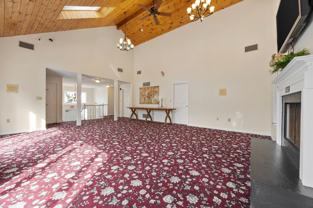 120 Abington Road, Unit 120 Danvers, MA 01923 - Photo 27 of 31 a view of empty room with wooden floor