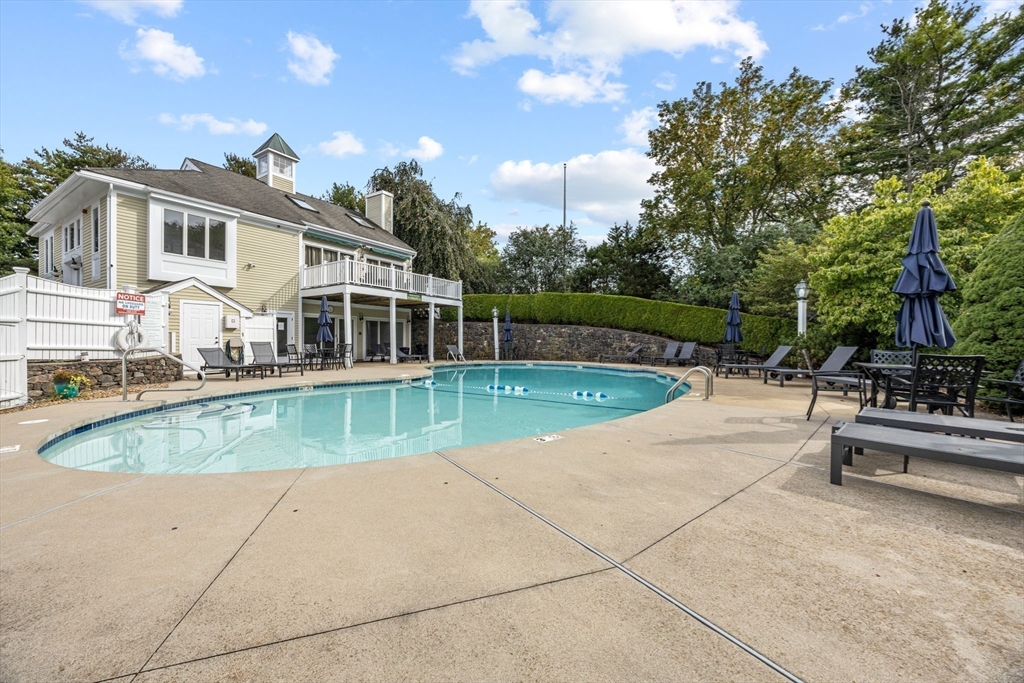 120 Abington Road, Unit 120 Danvers, MA 01923 - Photo 28 of 31 a view of a house with swimming pool