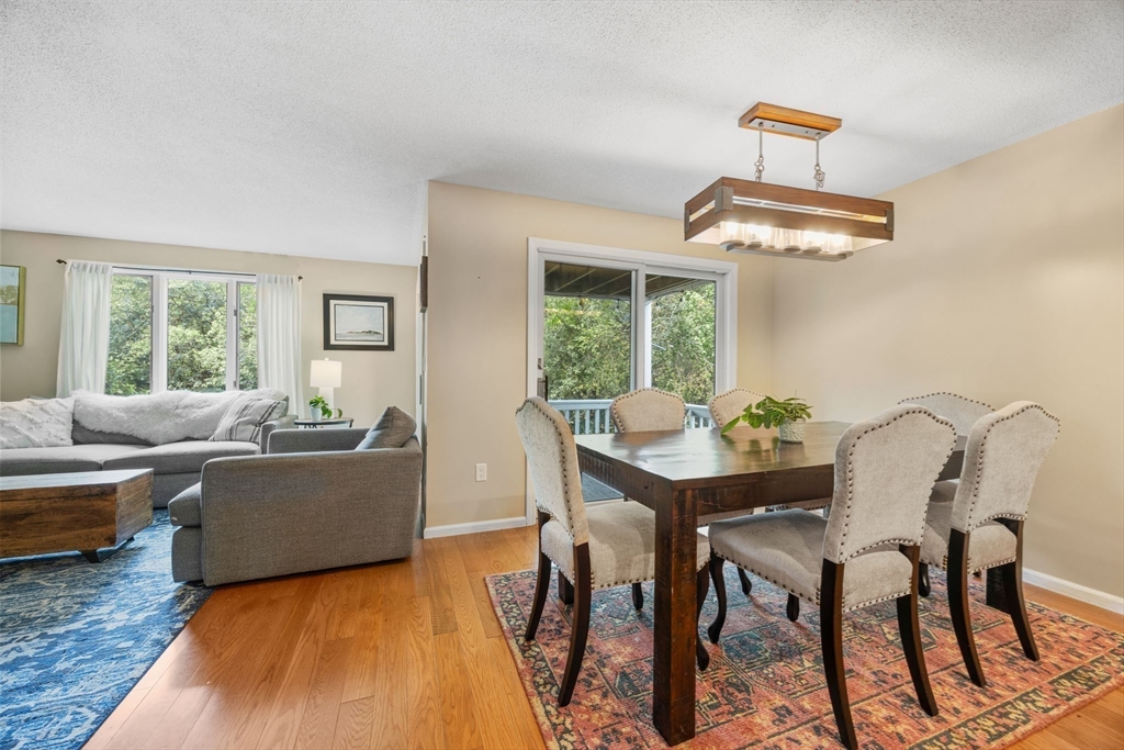 120 Abington Road, Unit 120 Danvers, MA 01923 - Photo 10 of 31 a living room with furniture and a window