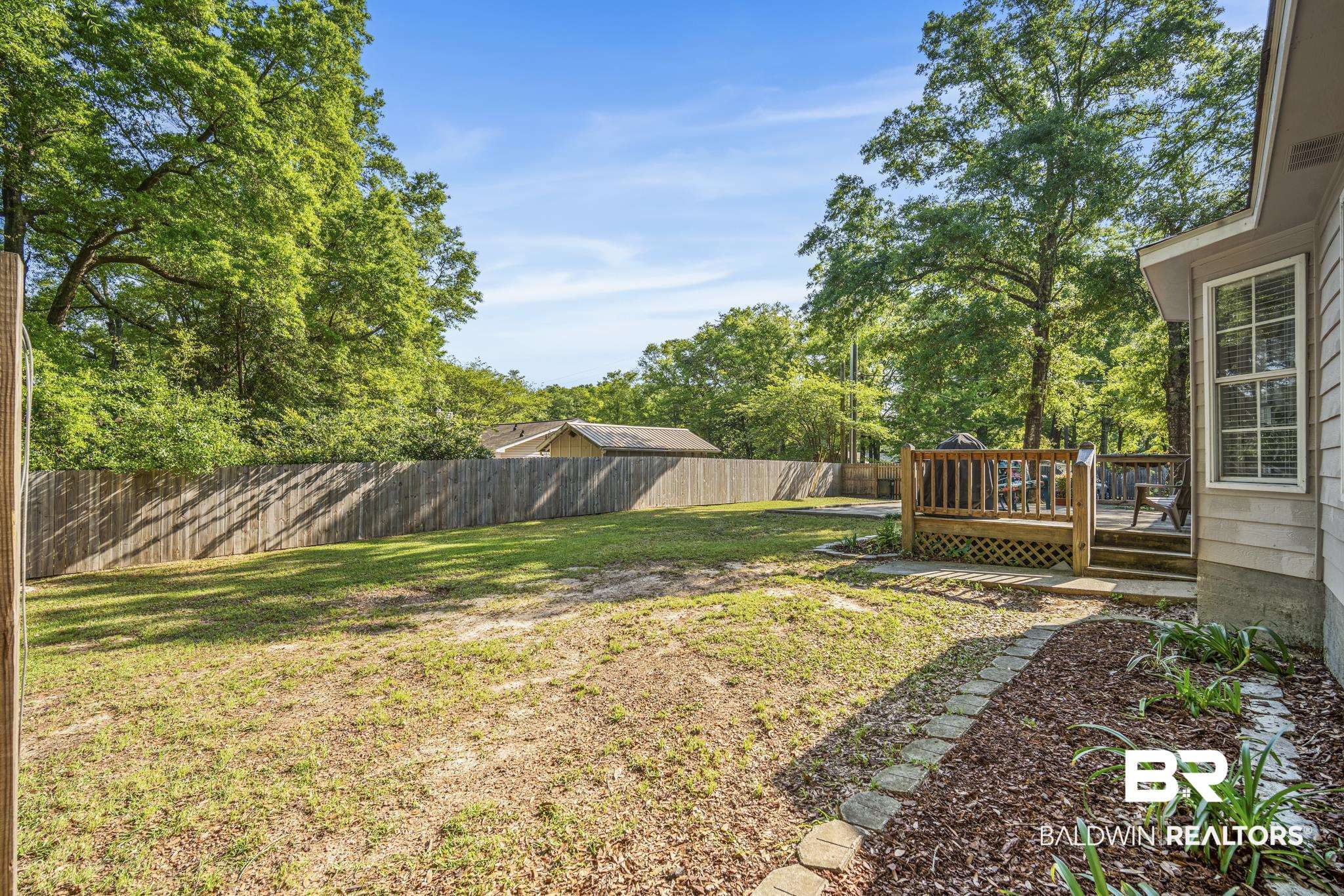 117 Richmond Road Daphne, AL 36526 - Photo 35 of 41 View of yard with a deck