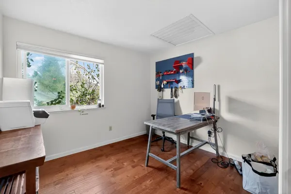 a room with furniture and a window