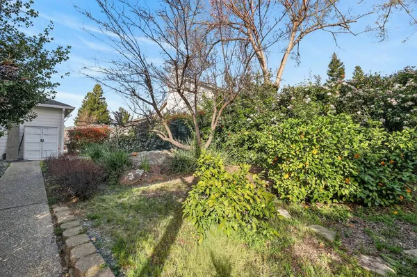 a backyard of a house with lots of green space