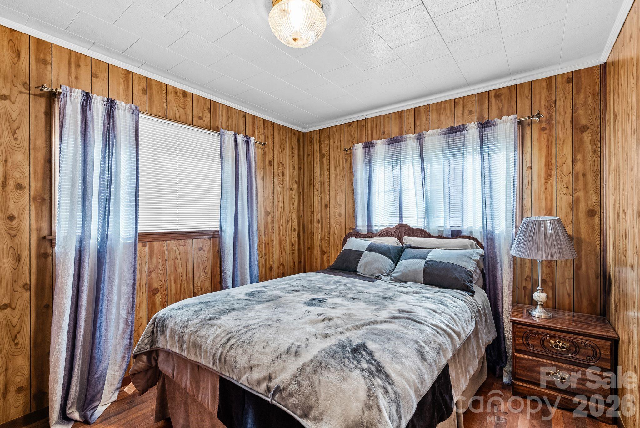 148 Monteith Road Brevard, NC 28712 - Photo 20 of 39 a bedroom with a bed and a dresser