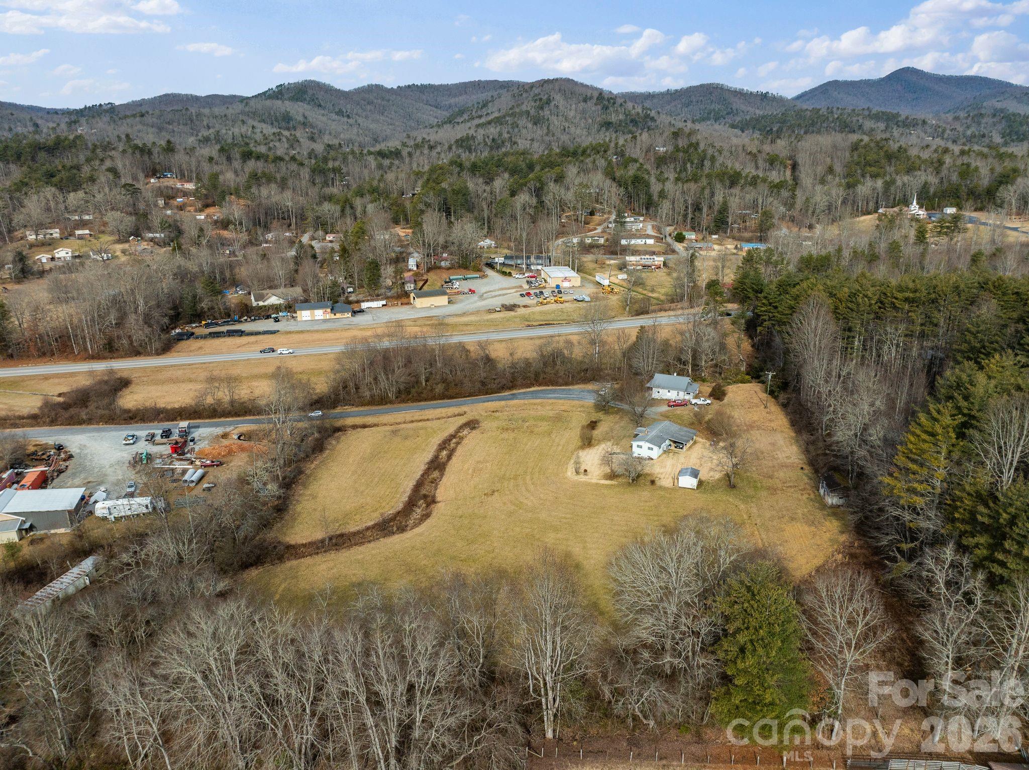 148 Monteith Road Brevard, NC 28712 - Photo 6 of 39 a view of a town with mountains in the background