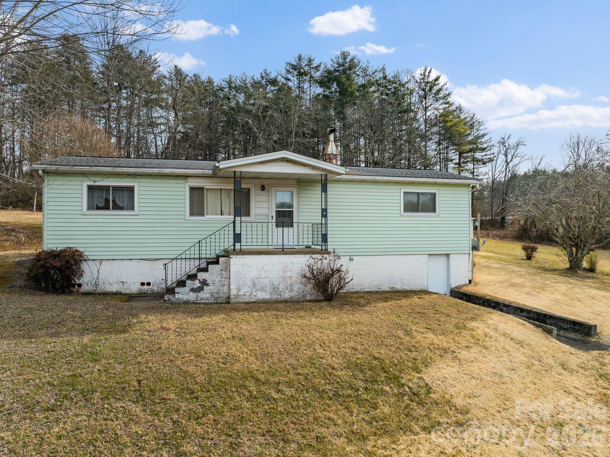 148 Monteith Road Brevard, NC 28712 - Photo 10 of 39 a view of a house with a yard