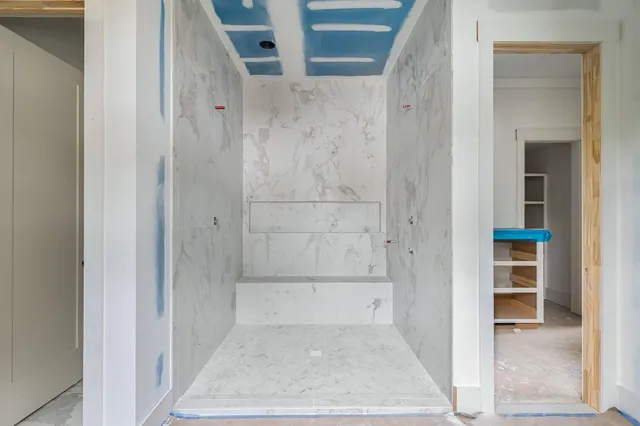 a view of kitchen with cabinets and wooden floor