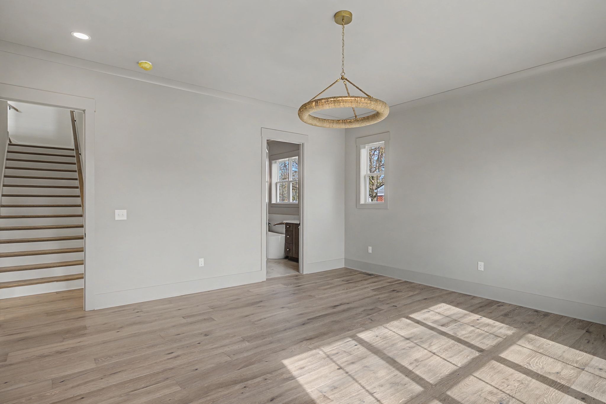 314 James Avenue Franklin, TN 37064 - Photo 21 of 43 a view of an empty room with a window and wooden floor