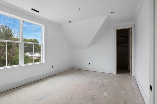 a view of an empty walk in closet