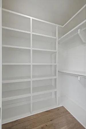 a view of an empty walk in closet