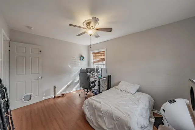 a bed room with a bed and furniture