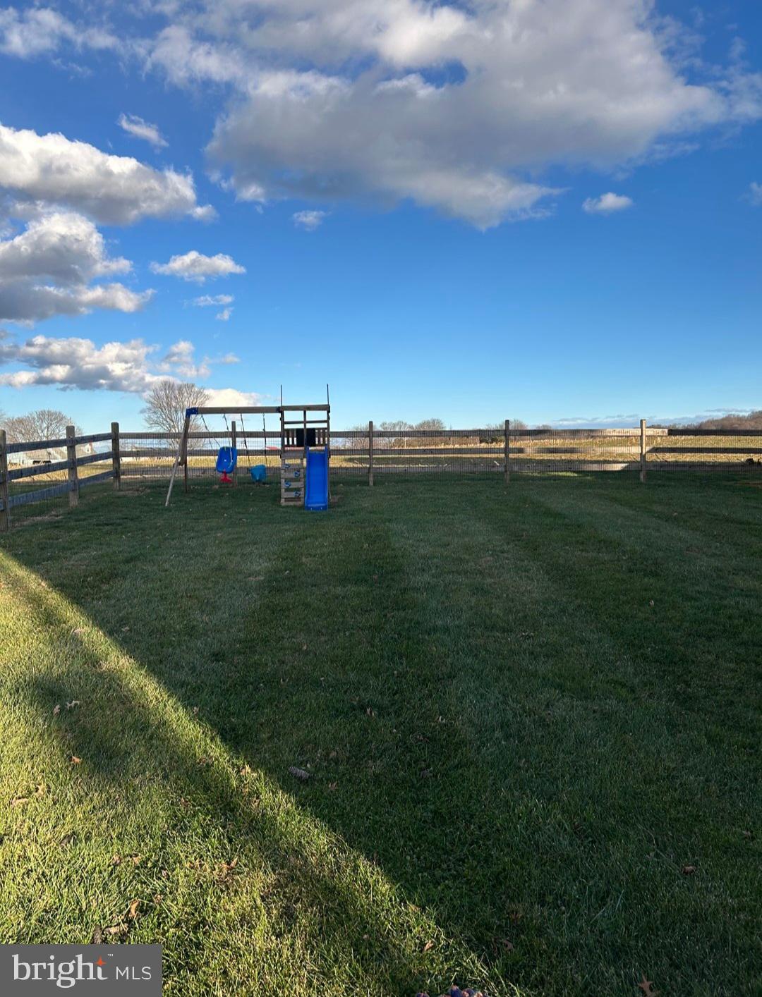 719 Marticville Road Pequea, PA 17565 - Photo 4 of 5 a view of a golf course with tv