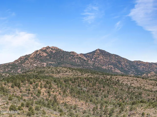 a view of mountains and valleys
